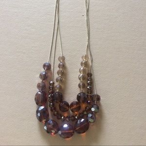 Silver necklace with brown beads